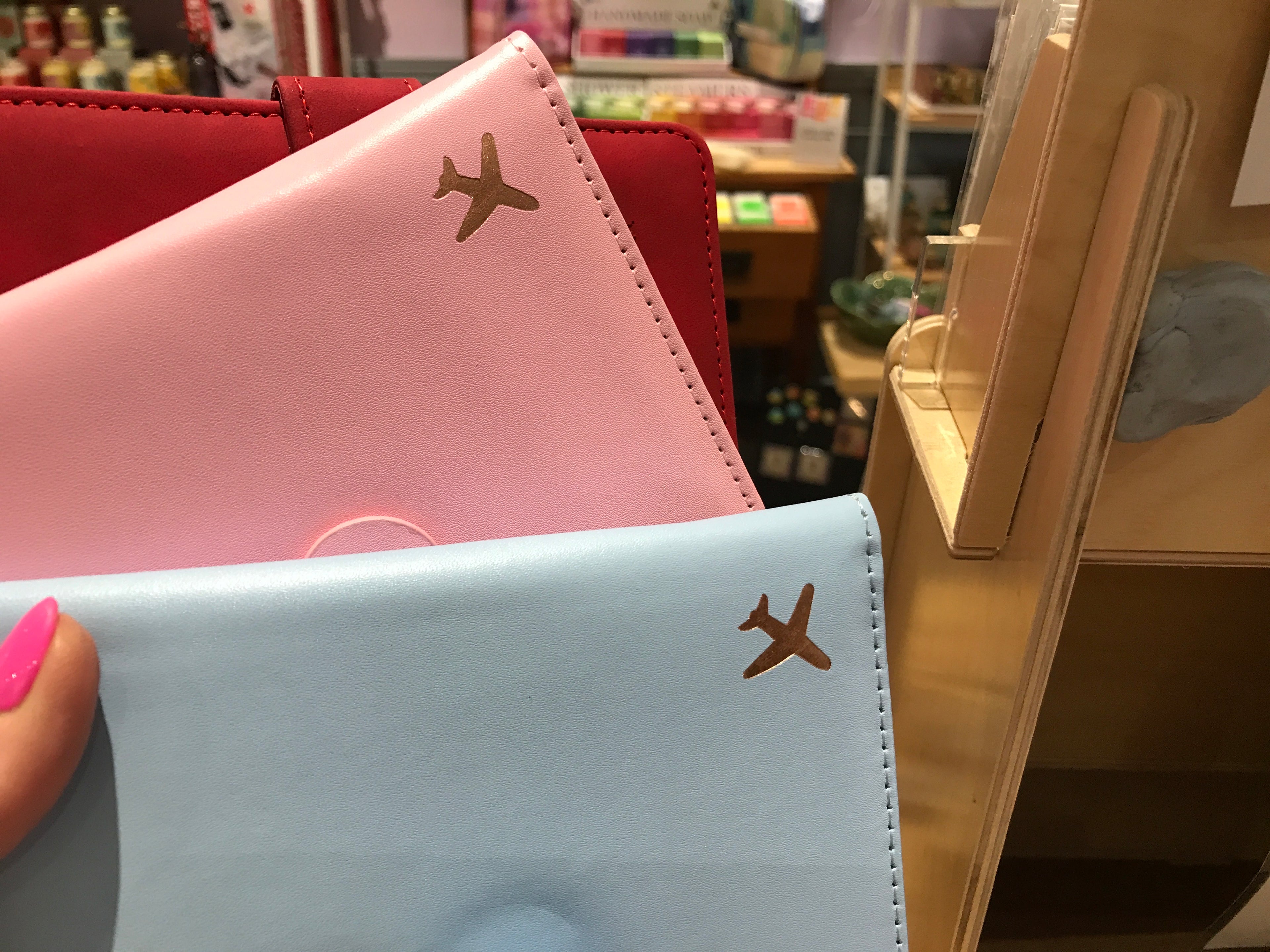 PASSPORT HOLDERS
