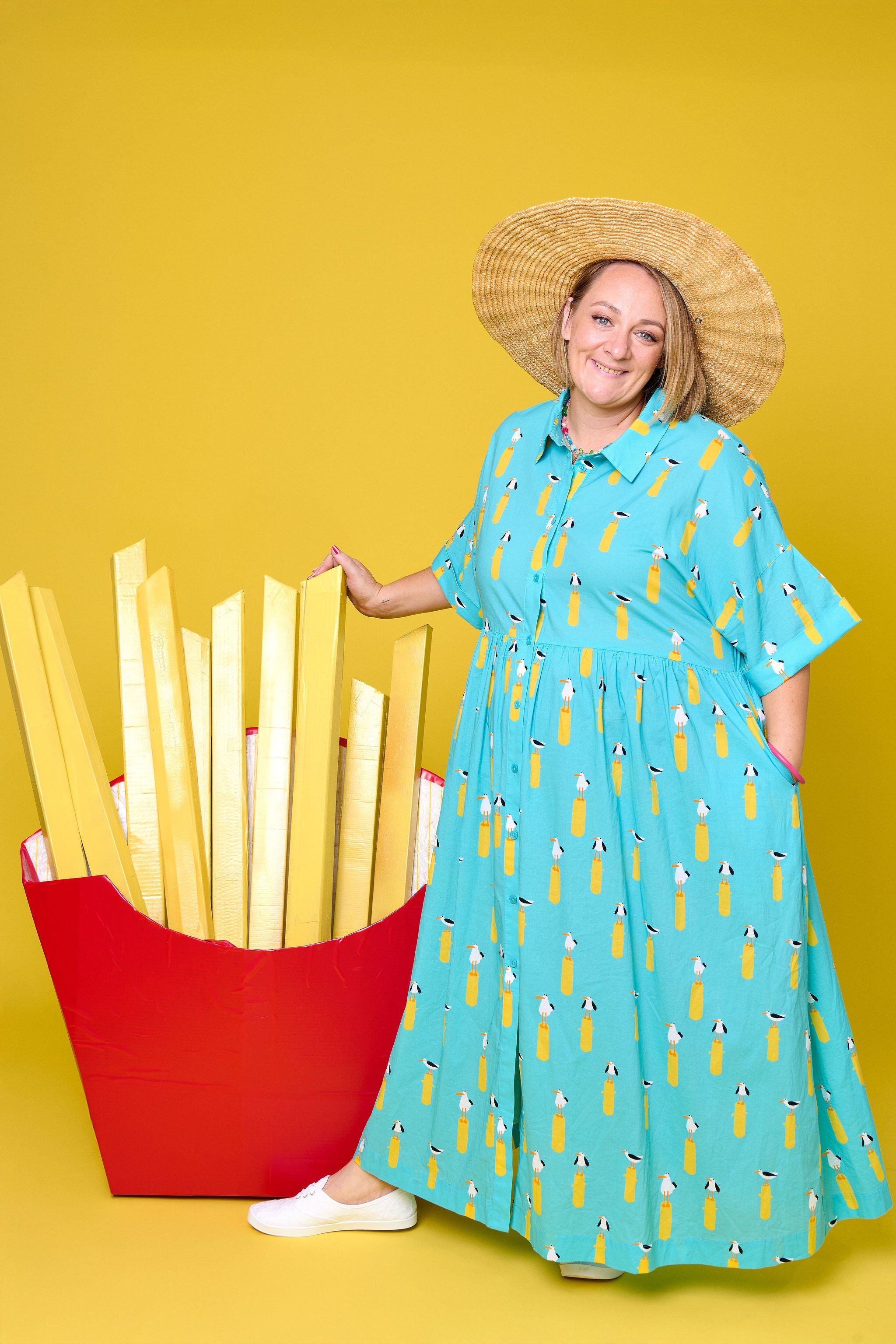 Model wearing Toomi Ultimate Maxi in Seagulls lightweight cotton v-neck dress in seagull print