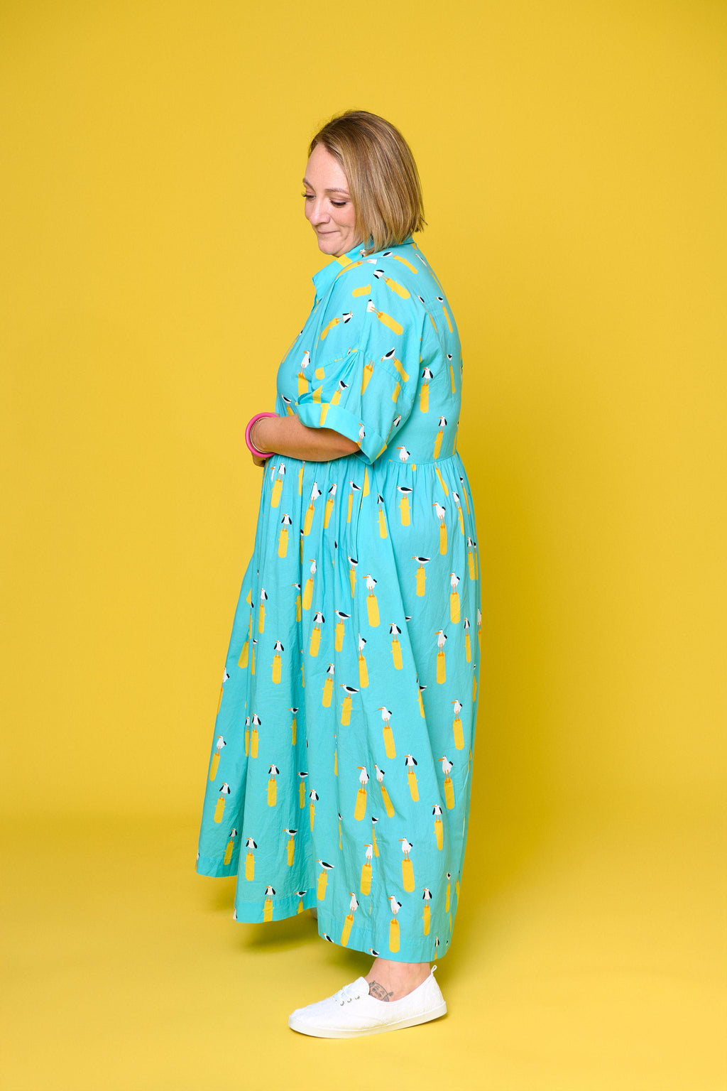 Model wearing Toomi Ultimate Maxi in Seagulls lightweight cotton v-neck dress in seagull print