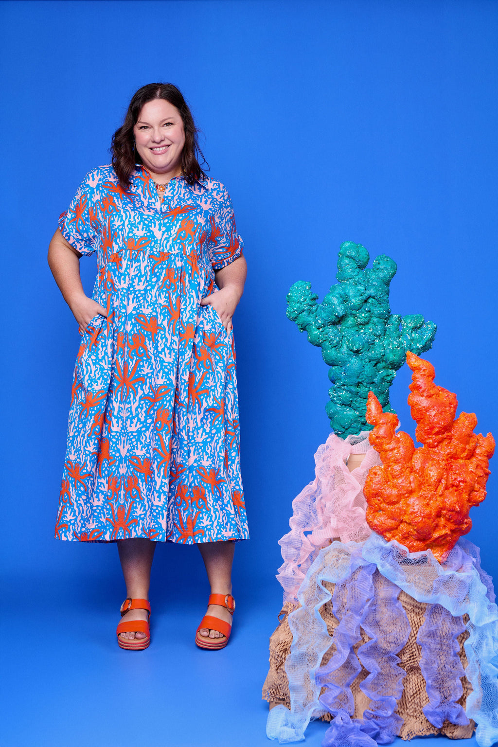 Model wearing Toomi Octopus Friends colourful v-neck cotton maxi dress in hand-illustrated octopus print