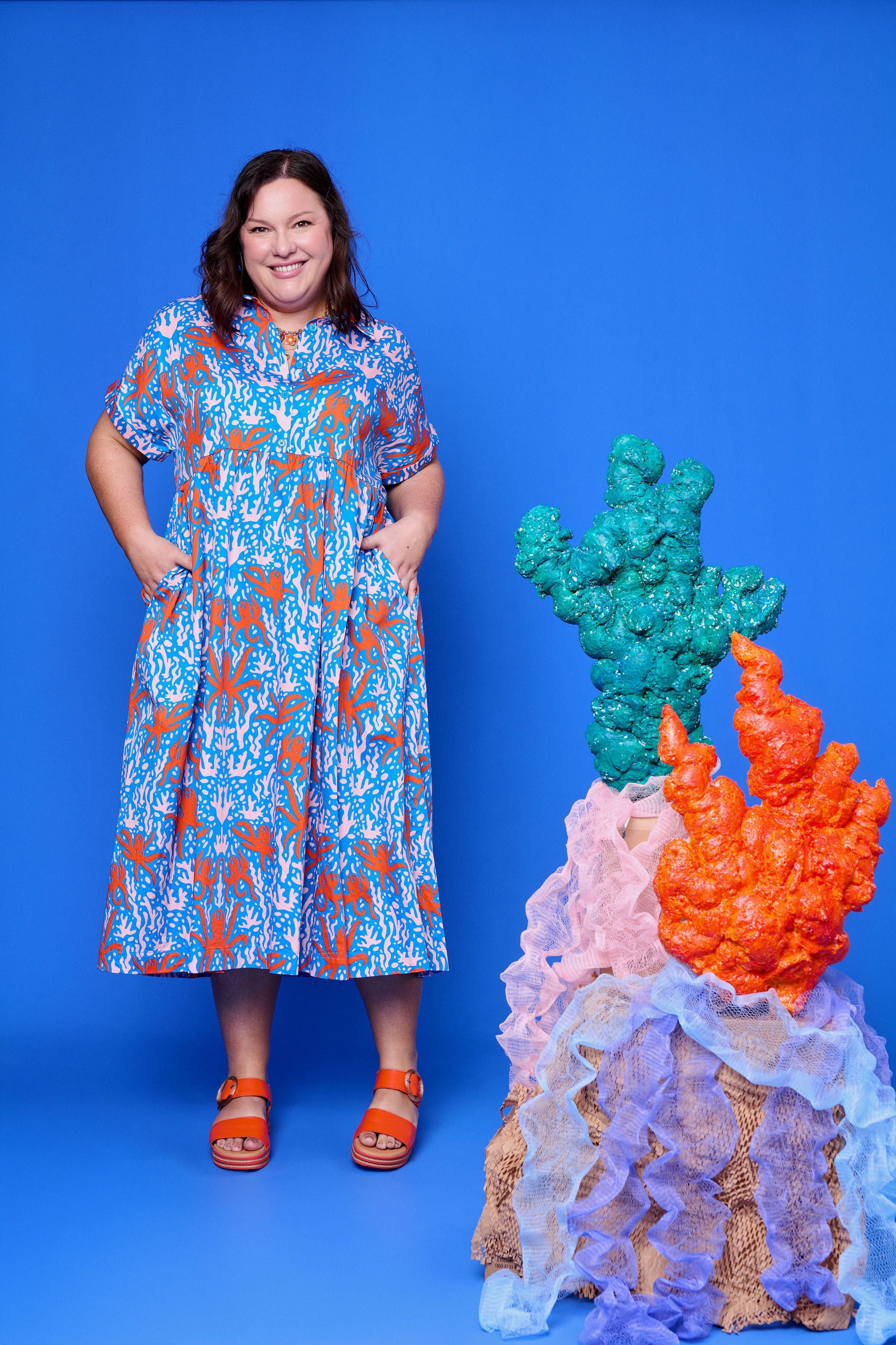 Model wearing Toomi Octopus Friends colourful v-neck cotton maxi dress in hand-illustrated octopus print