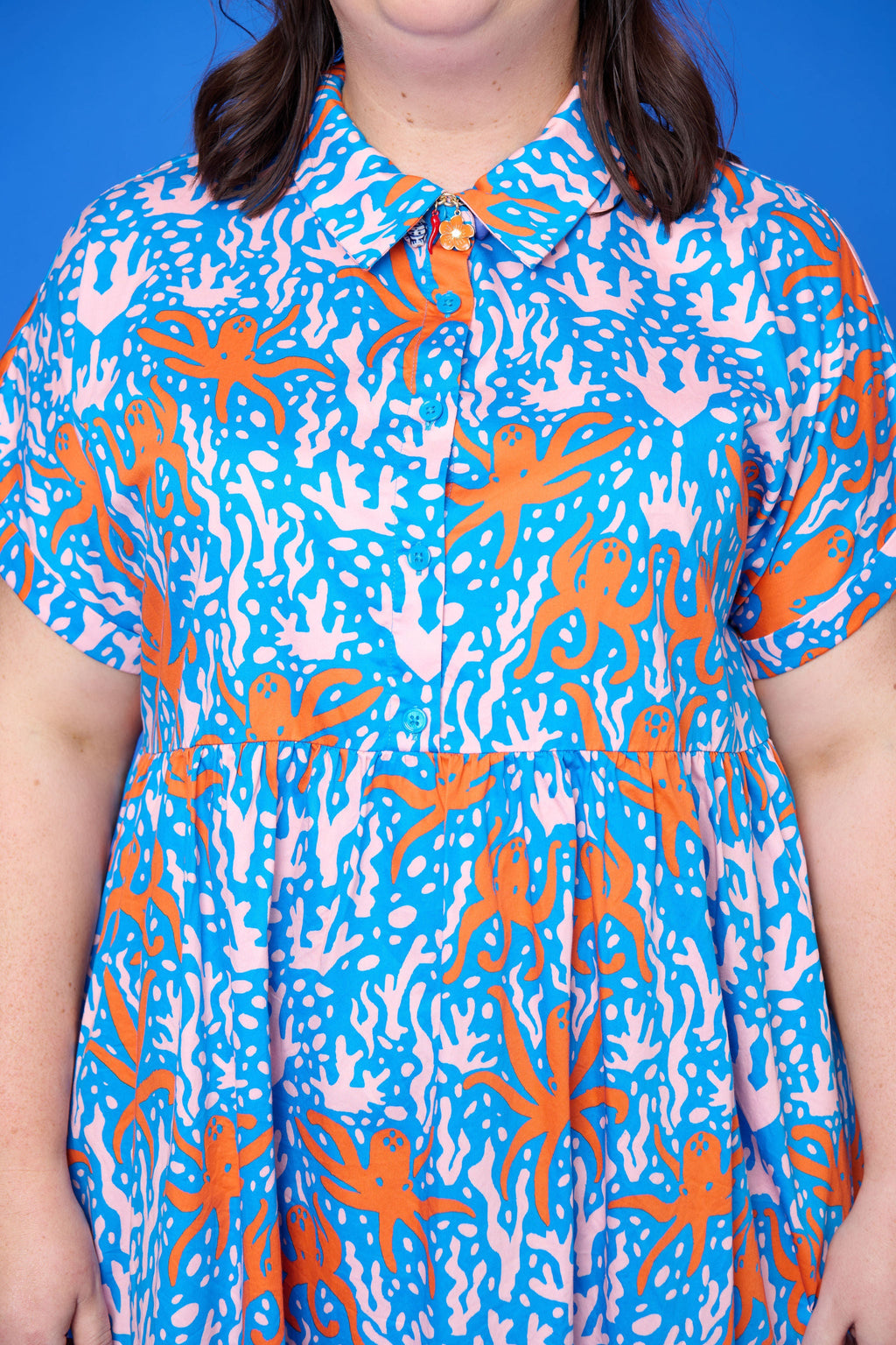 Model wearing Toomi Octopus Friends colourful v-neck cotton maxi dress in hand-illustrated octopus print