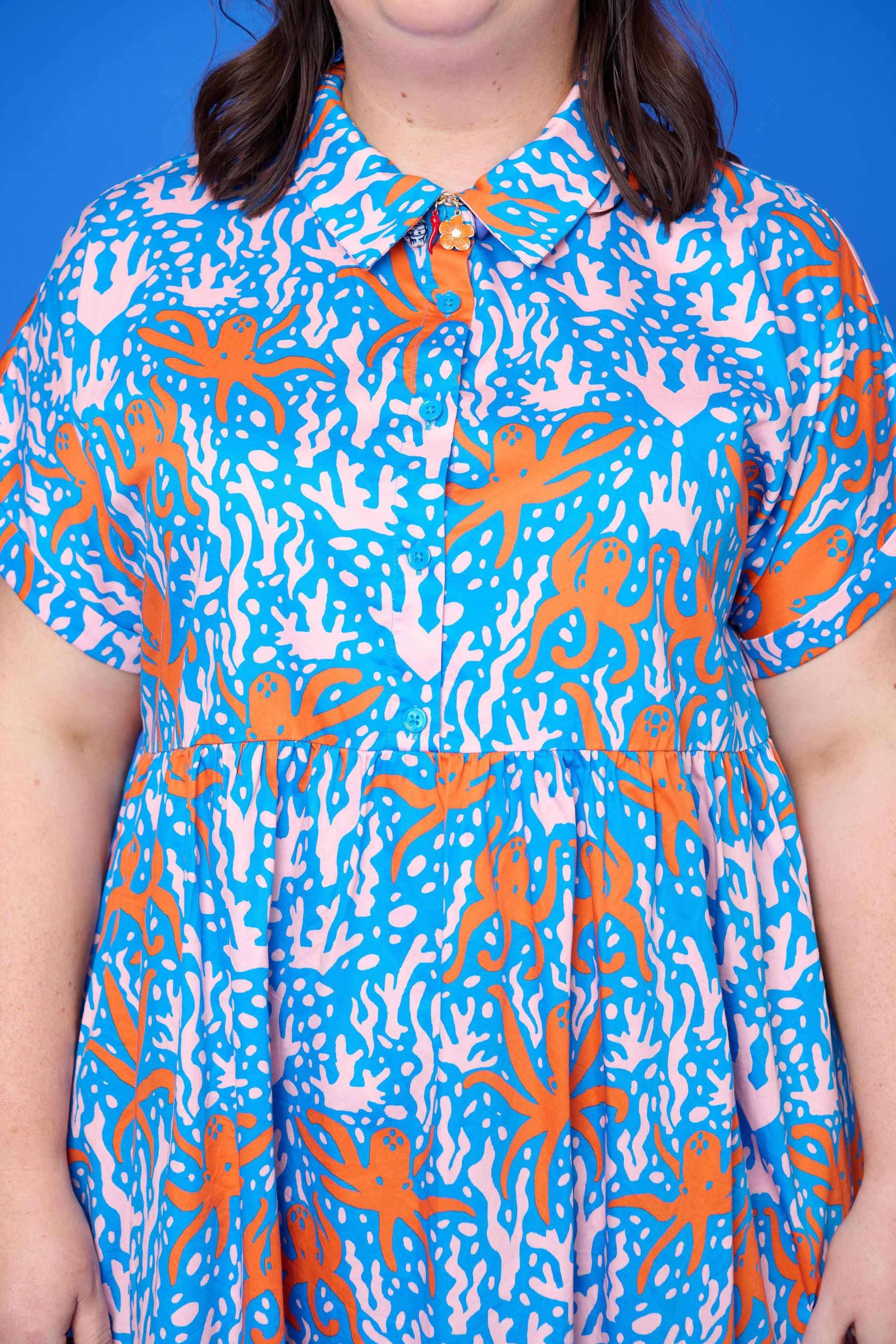 Model wearing Toomi Octopus Friends colourful v-neck cotton maxi dress in hand-illustrated octopus print