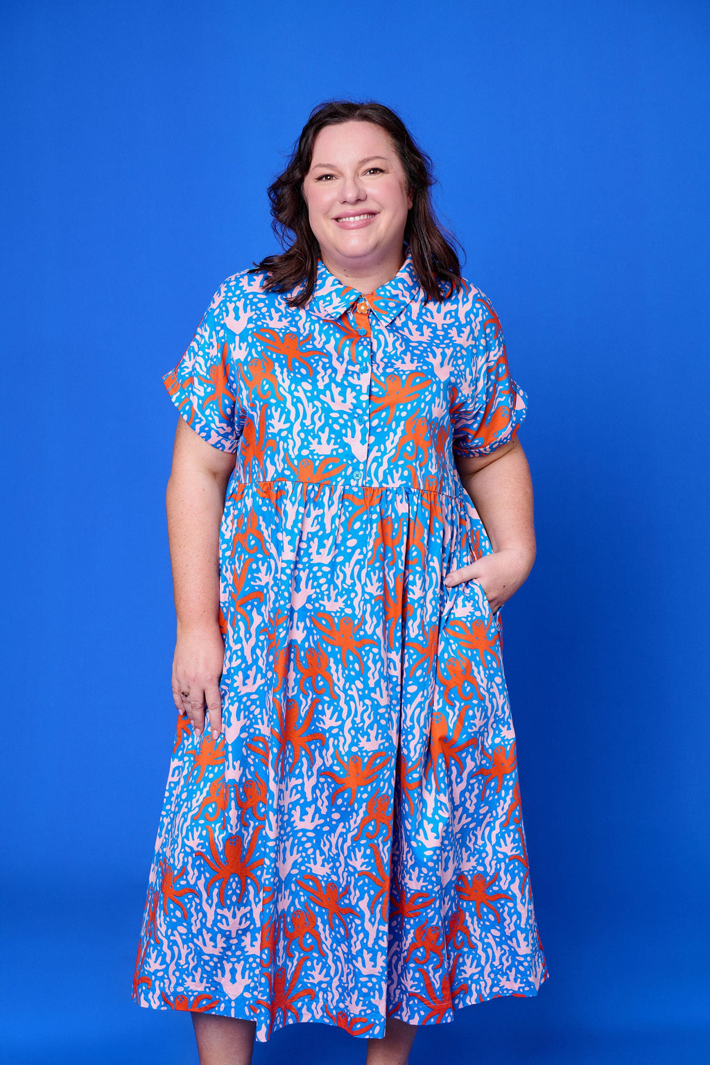 Model wearing Toomi Octopus Friends colourful v-neck cotton maxi dress in hand-illustrated octopus print