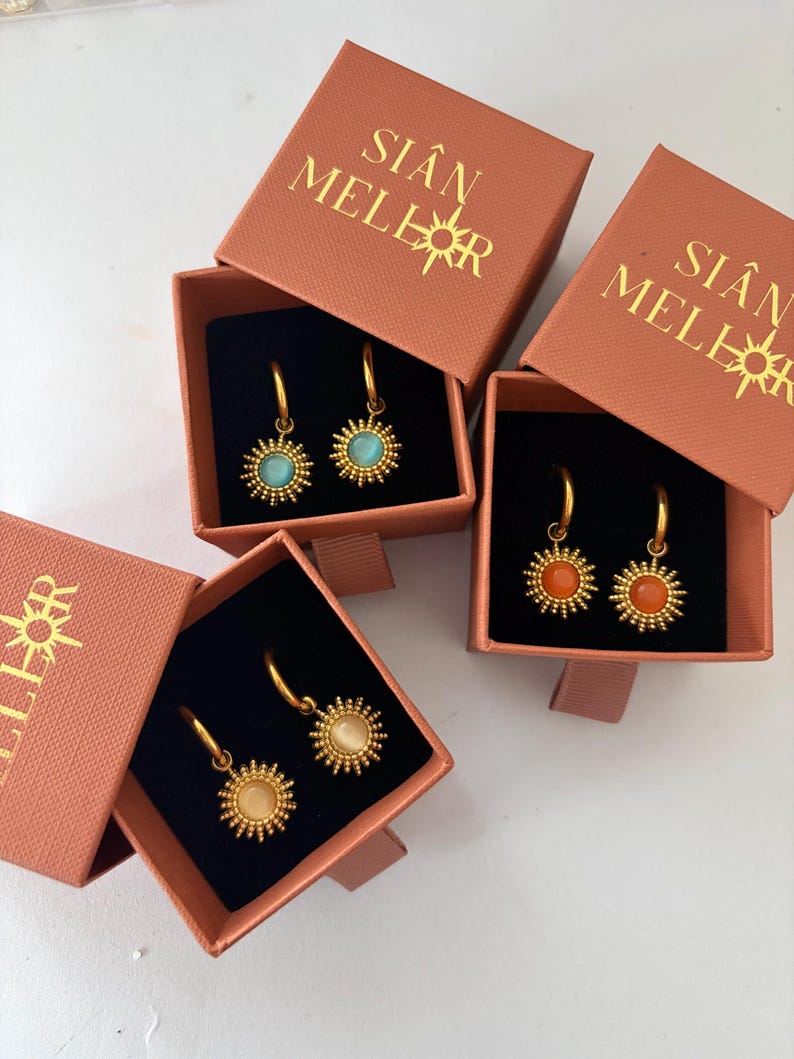 Sun huggie hoops in Sian Mellor boxes